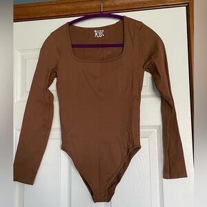 Womens Long Sleeve One-Piece Bodysuit in Brown